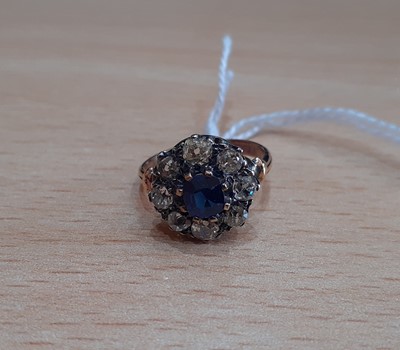 Lot 2138 - A Synthetic Sapphire and Diamond Cluster Ring...