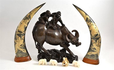 Lot 201 - Three ivory elephants (purchased between 1924-1932), Meiji ivory okimono, carved wood buffalo and a