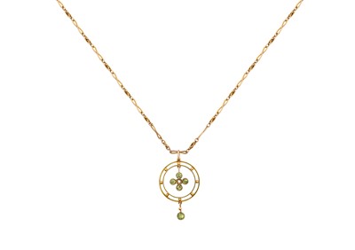 Lot 2148 - A Peridot and Split Pearl Pendant on Chain the...