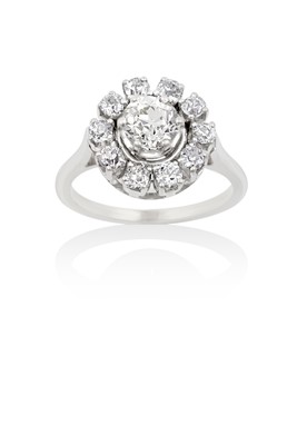 Lot 2004 - A Diamond Cluster Ring the central raised old...