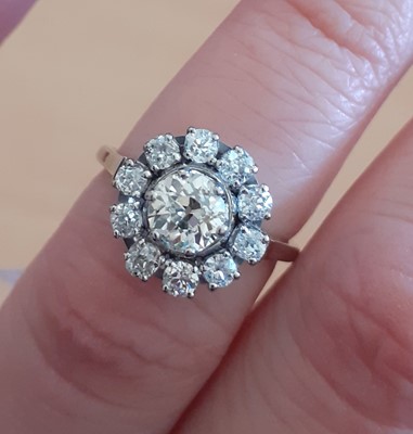 Lot 2078 - A Diamond Cluster Ring the central raised old...