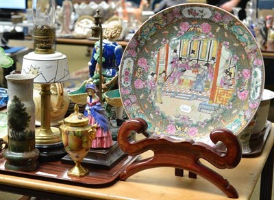 Lot 207 - A Cantonese charger and stand, a Doulton figural lamp base, an Art Deco oil lamp, a Coalport...