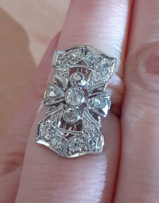 Lot 2014 - An Art Deco Style Diamond Cluster Ring three...