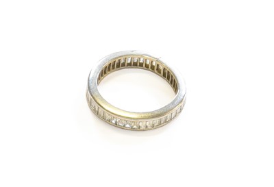 Lot 341 - A Diamond Eternity Ring, the baguette cut...