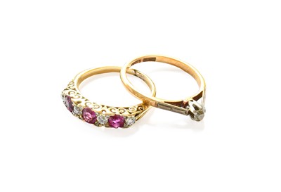 Lot 138 - A Synthetic Ruby and Diamond Five Stone Ring,...