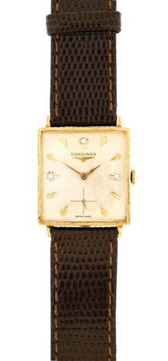 Lot 2403 - Longines: A 14 Carat Gold Square Shaped...