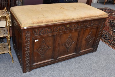 Lot 1320 - A Carved Oak Three Panel Coffer, with lunette...