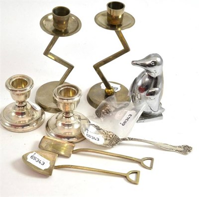 Lot 215 - Box including sterling silver spoon, pair of dwarf silver candlesticks, novelty corkscrew, Art Deco