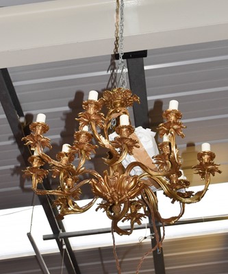 Lot 1273 - A Gilt Metal Sixteen Light Electrolier, with...