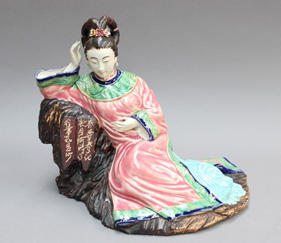 Lot 245 - A Chinese Porcelain Figure, of a lady in...
