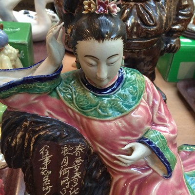 Lot 245 - A Chinese Porcelain Figure, of a lady in...
