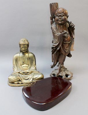 Lot 110 - A Chinese Carved Hardwood Figure, together...