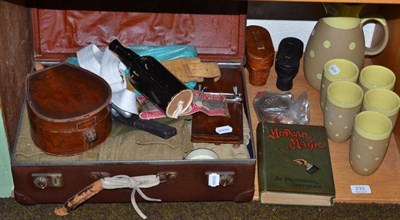 Lot 233 - Shelf of collectables including magic book and tricks, lemonade set, opera glasses, a case...