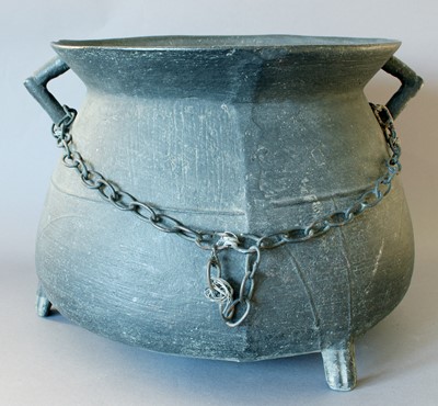 Lot 24 - A Bronze Cauldron, with angled handles and...