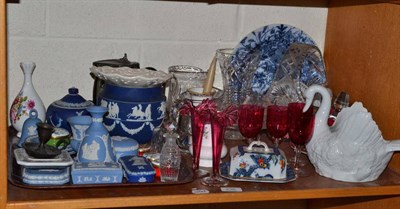 Lot 236 - A shelf of decorative ceramics and glass including a set of three swan vases, Halcyon Days...