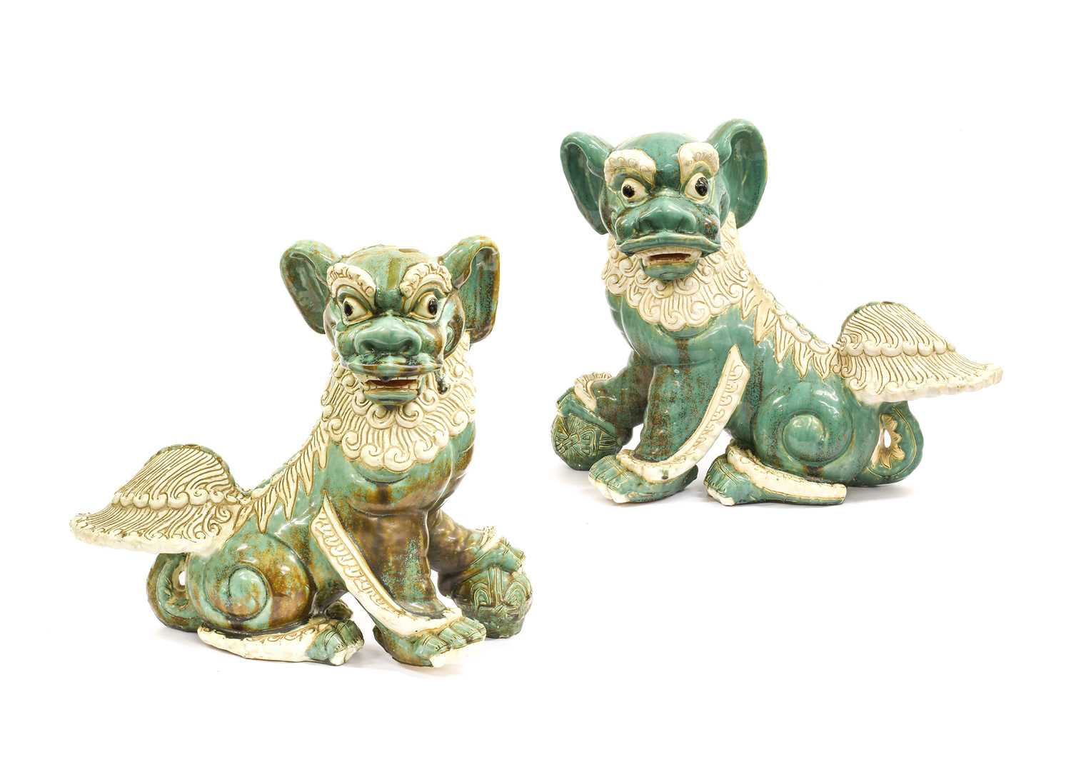 Lot 273 - A Pair of Chinese Turquoise-Glazed Dogs of Fo,...