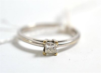 Lot 243 - An 18ct white gold solitaire ring