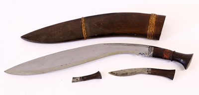 Lot 139 - A Nepalese Kukri, the 43cm steel blade with...