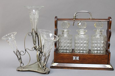 Lot 338 - An Oak Three Decanter Tantalus, with key and...