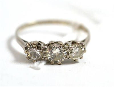 Lot 251 - A diamond three stone ring