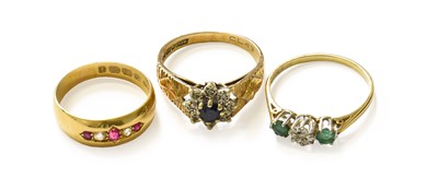 Lot 167 - An 18 Carat Gold Ruby and Diamond Five Stone...