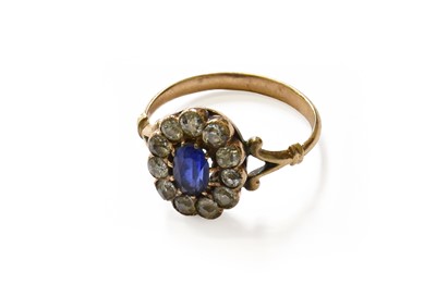 Lot 199 - A Sapphire and Diamond Cluster Ring, unmarked,...