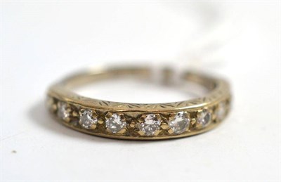 Lot 261 - A diamond half eternity ring