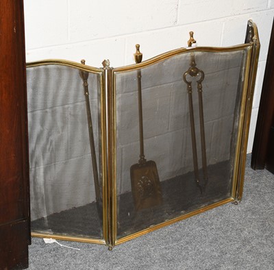 Lot 1280 - A Three-Fold Brass Fire Screen and Fire Irons