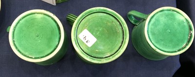 Lot 53 - A Green-Glazed Earthenware Teapot and Cover,...