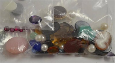 Lot 266 - Assorted loose gemstones, including shell, agate, sapphire, an onyx plaque set with a diamond,...