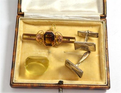 Lot 269 - A 9ct gold bar brooch with mounted gemstone, pair of silver cufflinks and a fob swivel