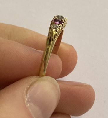 Lot 48 - An 18 Carat Gold Ruby and Diamond Five Stone...