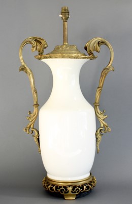 Lot 4 - A Gilt Metal Mounted White Porcelain Lamp,...
