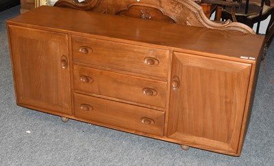 Lot 1294 - An Ercol Light Elm Sideboard, 155cm by 43cm by...