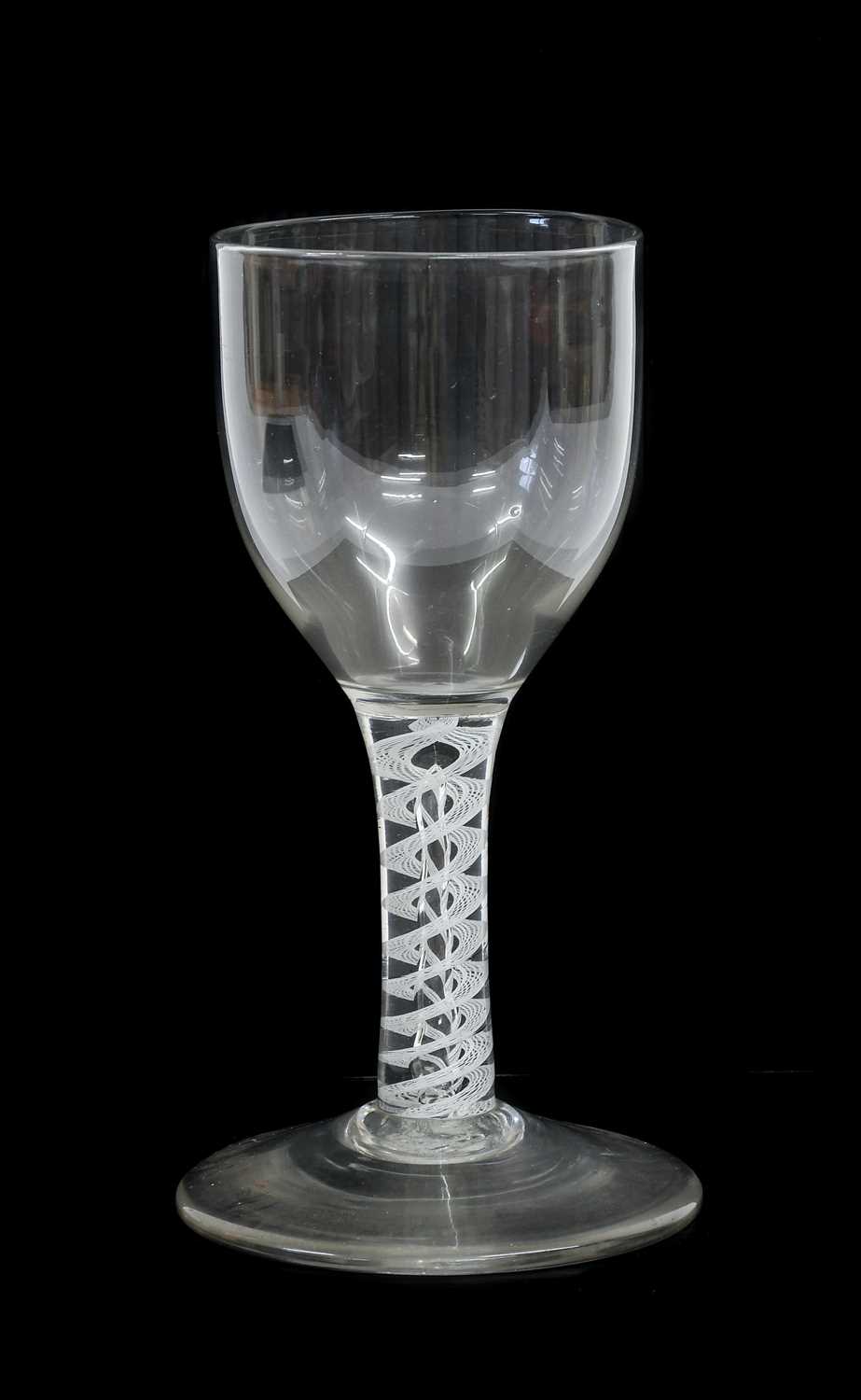 Lot 10 - A Mixed Twist Wine Glass, circa 1750, to ovoid...