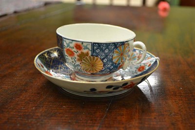 Lot 30 - A First Period Worcester Porcelain Tea Cup and Saucer, circa 1770, painted with the Old Mosaic...