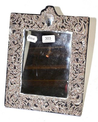 Lot 303 - An Edwardian silver mounted easel back toilet mirror, London 1903