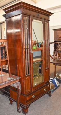 Lot 1459 - A Victorian Mahogany Wardrobe, with mirrored...