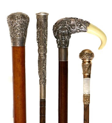 Lot 325 - A White Metal and Ivorine Mounted Walking Cane,...