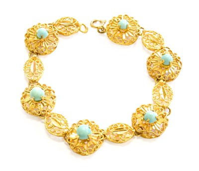 Lot 283 - A Turquoise Fancy Link Bracelet, stamped '750',...