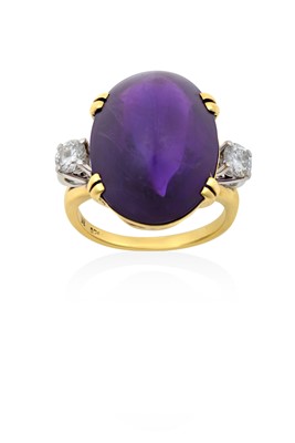 Lot 2170 - An Amethyst and Diamond Three Stone Ring the...