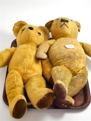 Lot 314 - An early 20th century jointed teddy bear and another (2)