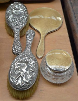 Lot 316 - A pair of Victorian silver hairbrushes, a silver and enamel jar and cover and a hand mirror