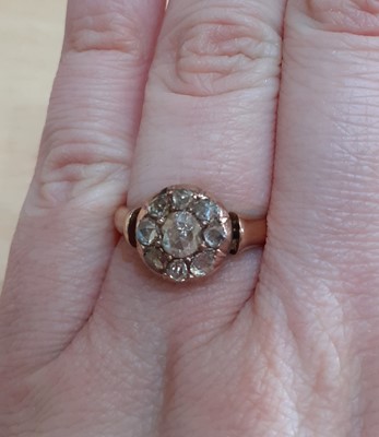 Lot 2175 - A Diamond Cluster Ring the central rose cut...