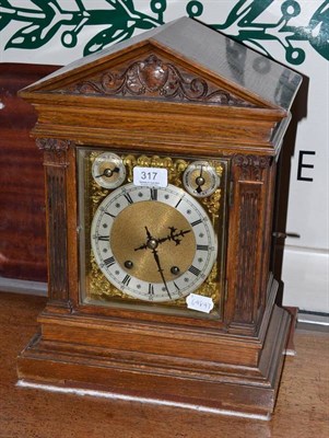 Lot 317 - A Winterhalder and Hofmeier oak bracket clock, movement stamped W&H with key