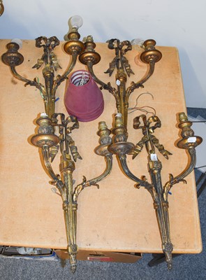 Lot 1098 - A Set of Four Gilt Metal Twin Light Wall...