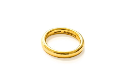 Lot 213 - A 22 Carat Gold Band Ring, finger size H1/2