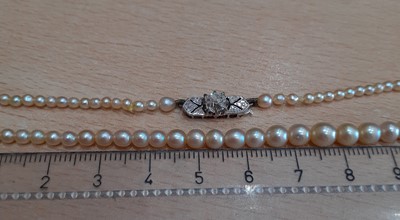 Lot 2155 - A Cultured Pearl Necklace, with A Diamond...