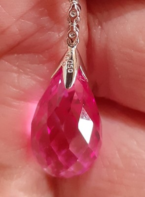 Lot 2021 - A Pink Tourmaline and Diamond Pendant on Chain...