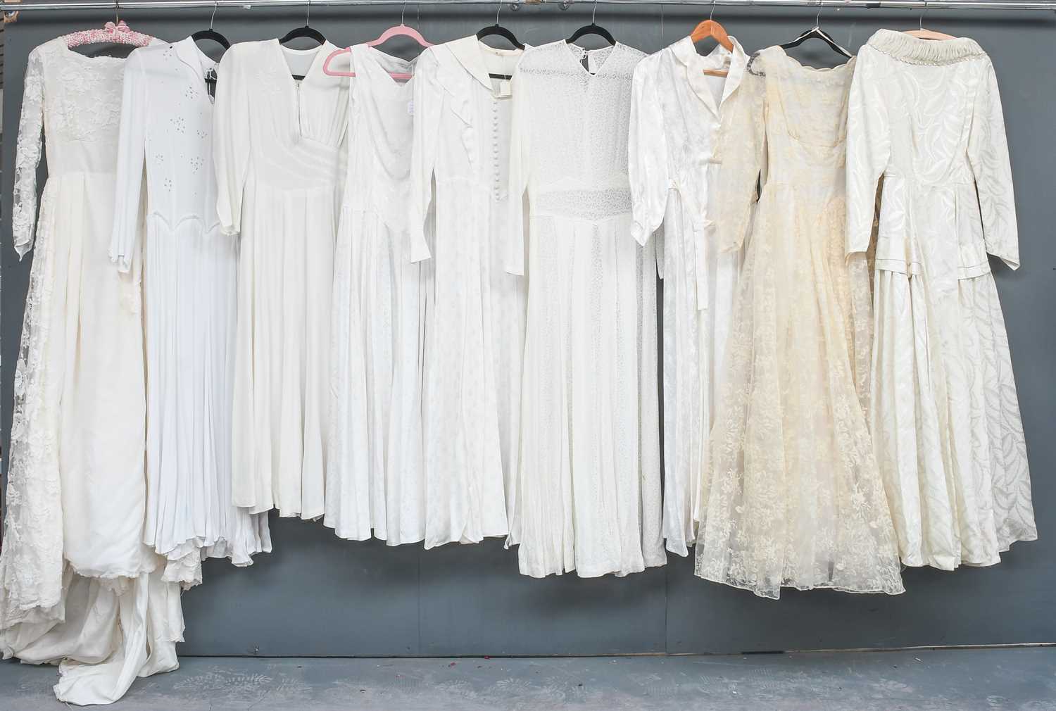 Lot 2070 - Circa 1930-60s Wedding Dresses, comprising a...